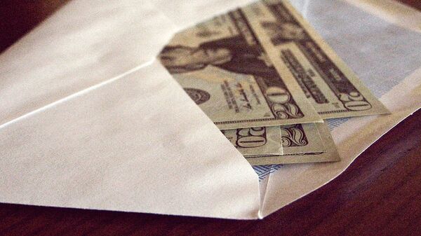Доллары в конверте, архивное фото - Sputnik Тоҷикистон
