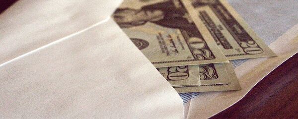Доллары в конверте, архивное фото - Sputnik Тоҷикистон