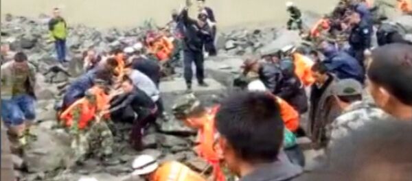 Погибшие и пропавшие без вести: последствия оползня в Китае Погибшие и пропавшие без вести: последствия оползня в Китае - Sputnik Таджикистан