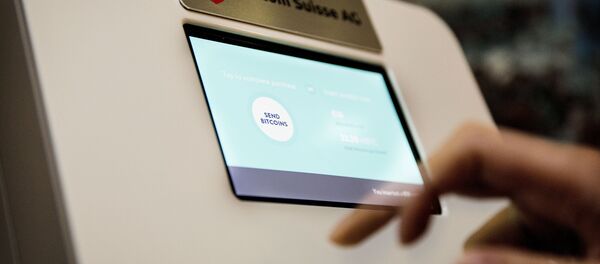 Bitcoin банкомат, архивное фото - Sputnik Таджикистан