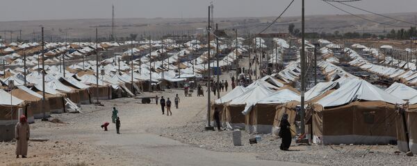 Лагерь беженцев в Мосуле, архивное фото - Sputnik Таджикистан