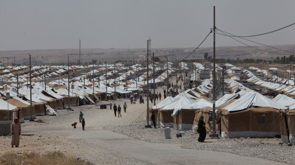 Лагерь беженцев в Мосуле, архивное фото - Sputnik Таджикистан