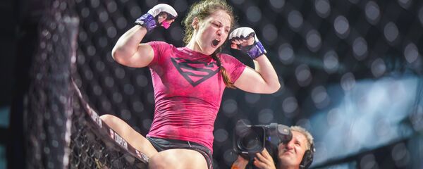 Женский бой на Fight Nights Global Global 71, архивное фото Женский бой на Fight Nights Global Global 71, архивное фото - Sputnik Таджикистан