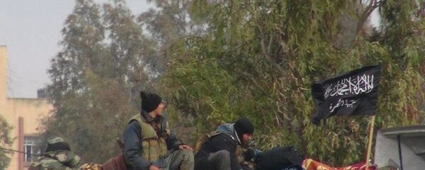 Боевики Джебхат ан-Нусра на грузовике с боеприпасами, архивное фото Боевики Джебхат ан-Нусра на грузовике с боеприпасами, архивное фото - Sputnik Тоҷикистон
