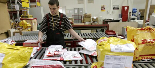 Работа представительства DHL, архивное фото - Sputnik Тоҷикистон