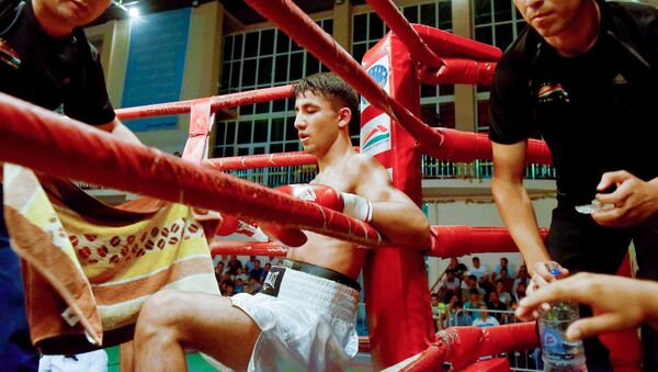 Боксер на турнире, архивное фото - Sputnik Таджикистан