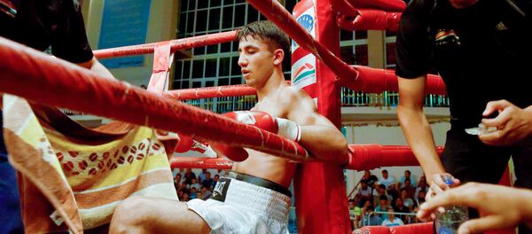 Боксер на турнире, архивное фото Боксер на турнире, архивное фото - Sputnik Таджикистан