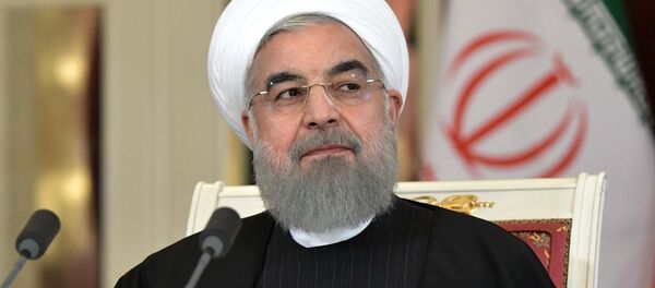 Президент Ирана Хасан Рухани, архивное фото - Sputnik Тоҷикистон