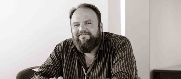 Глава Ассоциации исследователей государственной политики и государственного управления в Таджикистане Михаил Петрушков, архивное фото - Sputnik Тоҷикистон