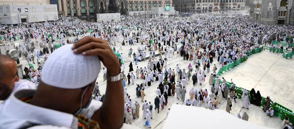 Паломники в Мекке, архивное фото Паломники в Мекке, архивное фото - Sputnik Тоҷикистон