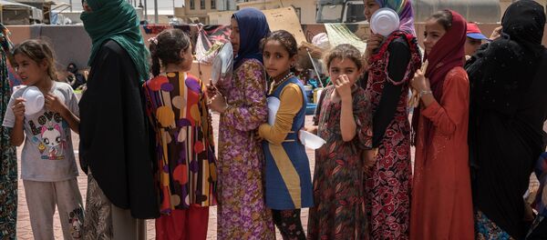 Женщины и дети в Ираке, архивное фото Женщины и дети в Ираке, архивное фото - Sputnik Таджикистан