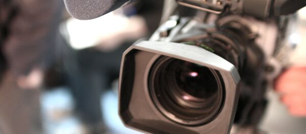 Видеокамера, архивное фото Видеокамера, архивное фото - Sputnik Таджикистан