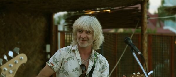 Таджикский музыкант Кайд, архивное фото Таджикский музыкант Кайд, архивное фото - Sputnik Таджикистан