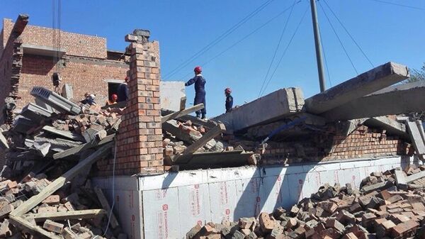 Перекрытие и стена обрушились в строящемся доме в Астане - Sputnik Тоҷикистон