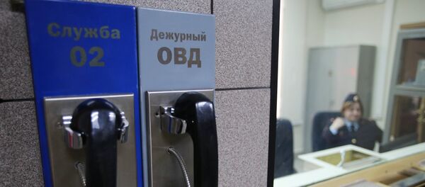 Телефон дежурной части ОВД в Москве, архивное фото Телефон дежурной части ОВД в Москве, архивное фото - Sputnik Таджикистан