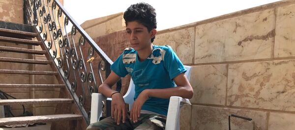 Подросток Мохамед Ахмад, переживший со своей семьей осаду Дейр-эз-Зор - Sputnik Таджикистан