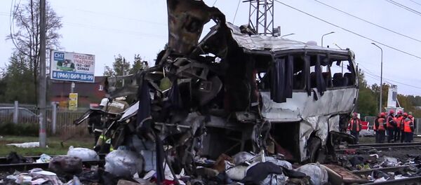 Автобус и поезд столкнулись на ж/д переезде во Владимирской области Автобус и поезд столкнулись на ж/д переезде во Владимирской области - Sputnik Таджикистан