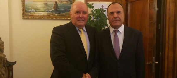 Зам. МИДа РТ Махмадшарифа Хакдода и Статс-секретарь – Зам. МИДа РФ Григорий Карасин - Sputnik Тоҷикистон