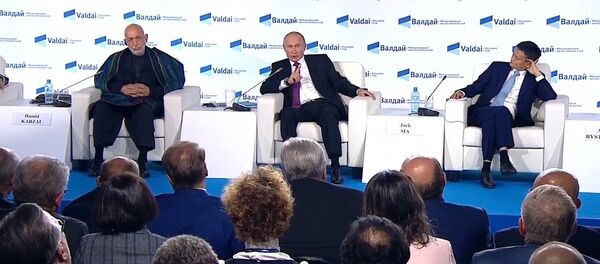 Владимир Путин о RT, Sputnik и про женщину-президента Владимир Путин о RT, Sputnik и про женщину-президента - Sputnik Таджикистан