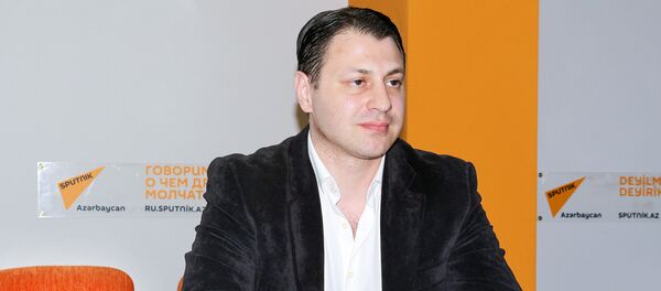 Политолог Анар Садыхов Политолог Анар Садыхов - Sputnik Таджикистан