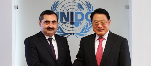 Музаффар Хусейнзода и Ли Ёнг, архивное фото - Sputnik Таджикистан