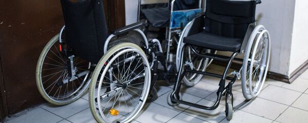 Инвалидные коляски, архивное фото Инвалидные коляски, архивное фото - Sputnik Тоҷикистон