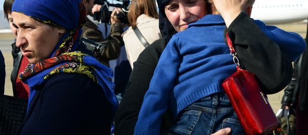 Вывезенные из Ирака семьи, архивное фото - Sputnik Таджикистан