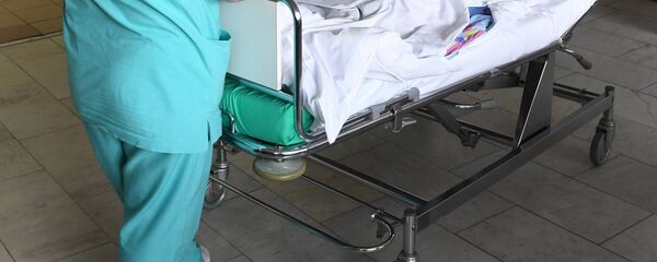 Пациент на больничной койке, архивное фото - Sputnik Таджикистан