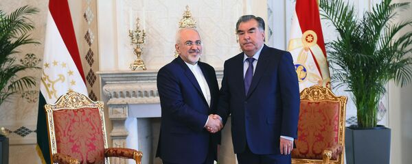Президент Таджикистана Эмомали Рахмон и министр иностранных дел Ирана Мохаммад Джавад Зариф Президент Таджикистана Эмомали Рахмон и министр иностранных дел Ирана Мохаммад Джавад Зариф - Sputnik Тоҷикистон
