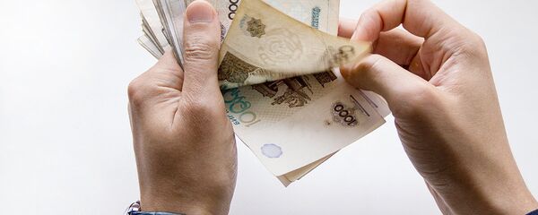 Узбекская валюта - сум, архивное фото - Sputnik Таджикистан