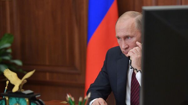 Президент РФ Владимир Путин, архивное фото - Sputnik Тоҷикистон