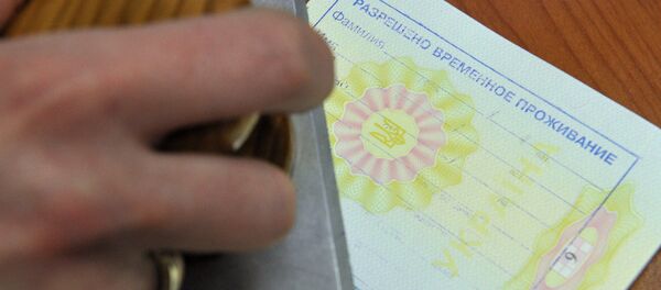 Выдача видов на жительство и разрешений на временное проживание, архивное фото Выдача видов на жительство и разрешений на временное проживание, архивное фото - Sputnik Таджикистан