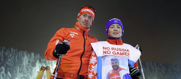 Школьник из Санкт-Петербурга Роман Старков, запустивший в соцсетях флешмоб в поддержку российских спортсменов #noRUSSIAnoGAMES - Sputnik Таджикистан