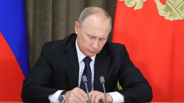 Президент России Владимир Путин, архивное фото - Sputnik Тоҷикистон