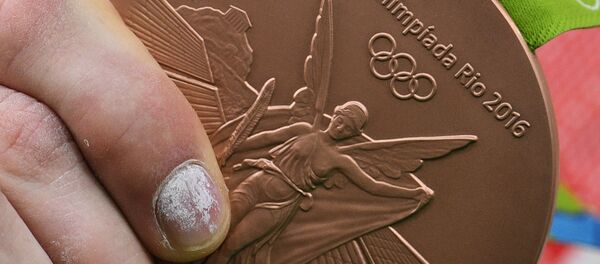 Олимпийская медаль, архивное фото - Sputnik Таджикистан