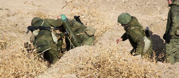 Военнослужащие 201-й военной базы оттачивают мастерство на горном полигоне Ляур Военнослужащие 201-й военной базы оттачивают мастерство на горном полигоне Ляур - Sputnik Таджикистан
