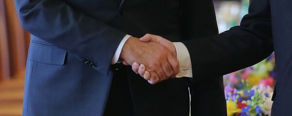 Рукопожатие, архивное фото Рукопожатие, архивное фото - Sputnik Тоҷикистон