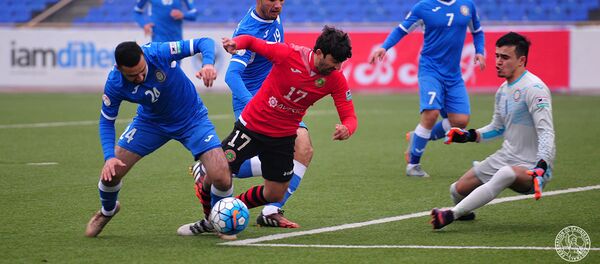 Футболисты на поле, архивное фото Футболисты на поле, архивное фото - Sputnik Таджикистан