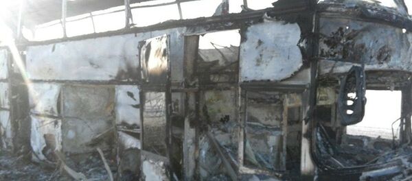 Сгоревший автобус в Казахстане Сгоревший автобус в Казахстане - Sputnik Таджикистан