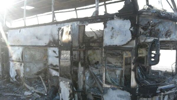 Сгоревший автобус в Казахстане - Sputnik Таджикистан