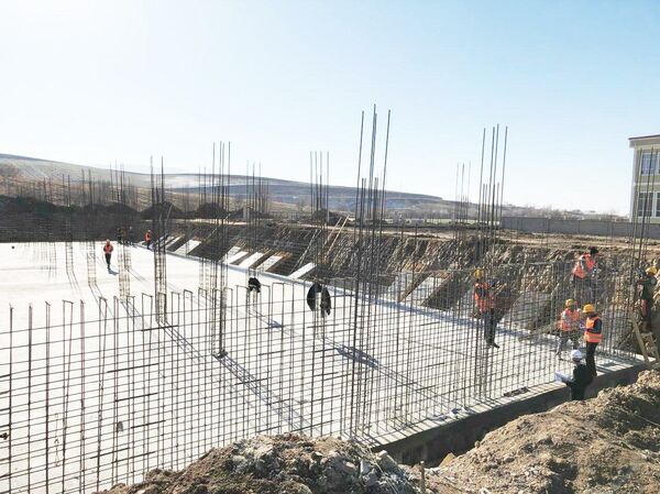 Сохтмони Коллеҷи оташнишонӣ дар Данғара - Sputnik Тоҷикистон