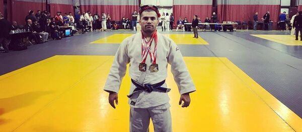Дзюдоист Хушбахт Курбонмамадов Дзюдоист Хушбахт Курбонмамадов - Sputnik Таджикистан