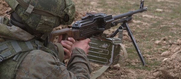 Военнослужащий РВБ в Таджикистане, архивное фото Военнослужащий РВБ в Таджикистане, архивное фото - Sputnik Тоҷикистон