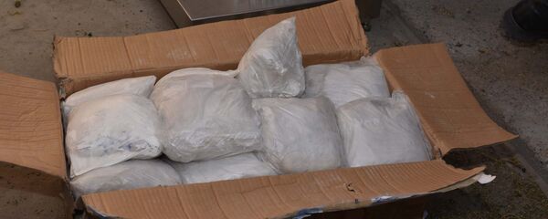 Уничтожение незаконных наркотических веществ, архивное фото - Sputnik Тоҷикистон