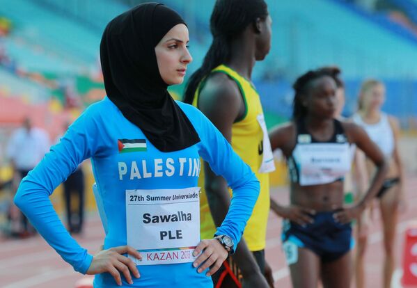Палестинка Воруд Савалха во время соревнований среди женщин по легкой атлетике на Универсиаде в Казани - Sputnik Таджикистан