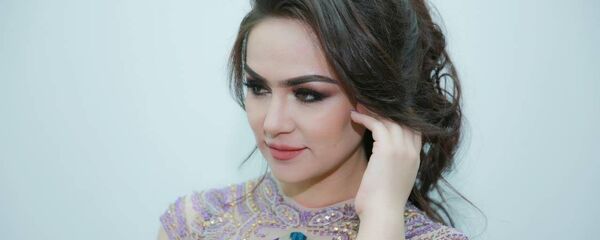 Нигина Амонкулова, архивное фото Нигина Амонкулова, архивное фото - Sputnik Тоҷикистон