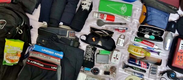 Сбор вещей перед путешествием, архивное фото Сбор вещей перед путешествием, архивное фото - Sputnik Таджикистан