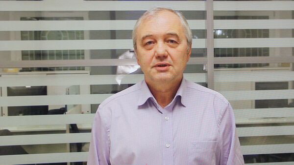 Виктор Марков, старший аналитик ИК Церих Кэпитал Менеджмент(фотография с экрана монитора) - Sputnik Таджикистан