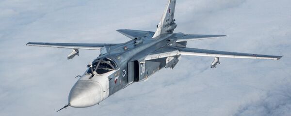 Бомбардировщик Су-24М, архивное фото - Sputnik Таджикистан