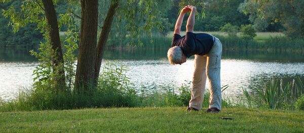 Зарядка, архивное фото Зарядка, архивное фото - Sputnik Тоҷикистон